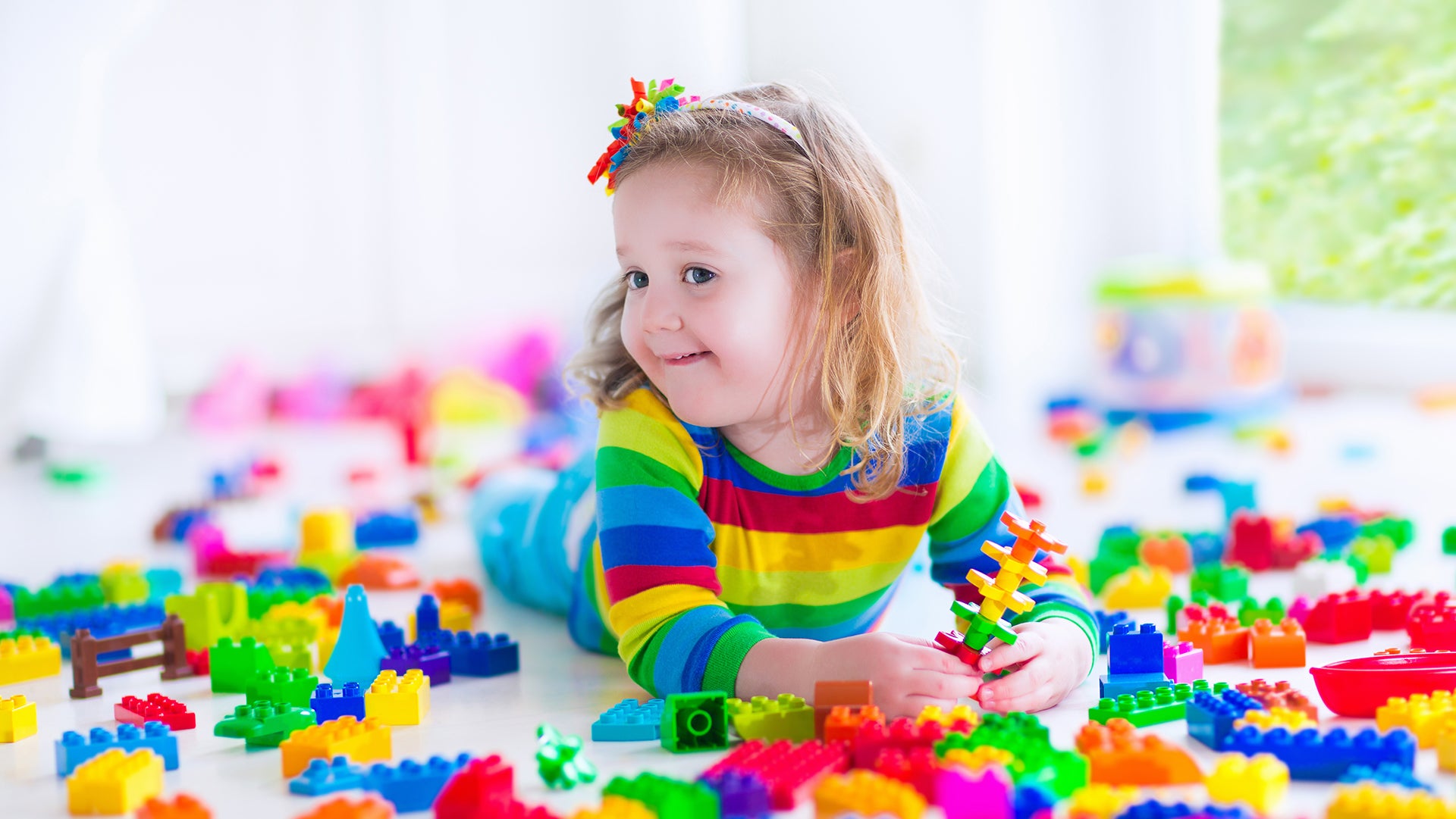 A Pretty girl playing with puzzle